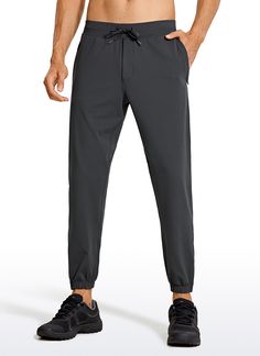 The lightweight Joggers are a bottom layer you cant go wrong with. Made of breathable and soft fabric, which is lightweight, stretchy, and smooth on your skin, quickly wicks away sweat during workout. Feature & Fitting: 
 Design for workout 
 Drawsring closure, 28 inches 
 Invisible zipper pockets 
 Ankle zippers 
 True to size 
 Fabric: 
 Naturally breathable 
 Stretchy and sweat-wicking 
 Soft and smooth 
 
 Lightweight 
 69%Polyamide, 31%Spandex Gray Stretch Pants For Jogging, Casual Black Running Sweatpants, Casual Midweight Yoga Pants For Sports, Casual Sports Yoga Pants, High Stretch Gray Jogging Bottoms, Functional Sports Joggers With Tapered Leg, Solid Color Joggers For Jogging, Sportswear Bottoms For Jogging With Breathable Fabric, High Stretch Gray Bottoms For Jogging