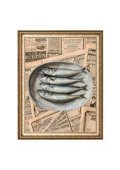 three fish on a plate with newspapers in the background and an old - fashioned frame