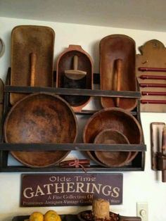 an assortment of old fashioned kitchen utensils