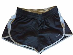 New Nike Women's HSC 2-in-1 Running Shorts  Style code:  799159 010 Black/Grey Size:  X-Small • Elastic waistband with interior drawcord.  • Moisture-wicking inner shorts.  • Lightweight DRI-Fit® fabric to keep moisture out.  • Compressive fit on inner shorts. The unstretched waist measured 13 1/4 inch across. The longest part of the outside leg is 10” and the measurement from the top of the waist to top of the side slit is 8”.   Please contact  us with any questions/concerns! Shorts Style, New Nike, Running Shorts, Black Grey, Dri Fit, Moisture Wicking, Nike Women, 4 Inch, Black And Grey