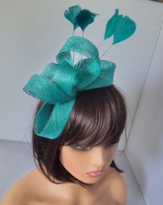 Turquoise Colour Fascinator With Flower Headband is attached Wedding Hat,Royal Ascot Ladies Day Size: small size  approx  Small size  Material:- Sinamay,Feathers Note :- I can't accept return.. Thanks                                                          Customer's returns fascinator or other items  to me so shop will deduct shipping cost from refund  Which shipping cost shop will pay or paid for customer orders  Thank you Elegant Turquoise Headpiece For Wedding, Elegant Turquoise Wedding Headpiece, Green Headband For Royal Ascot Wedding, Green Headband For Wedding At Royal Ascot, Green Fascinator With Handmade Flowers For Party, Green Wedding Headband For Royal Ascot, Elegant Green Hair Accessories For Wedding, Green Handmade Flowers Wedding Fascinator, Green Headband Fascinator For Wedding