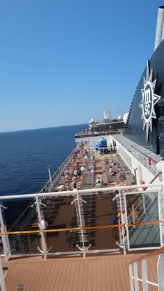 people are on the deck of a cruise ship