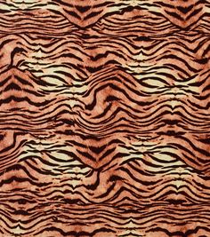 an animal print pattern with brown and black stripes on it's surface, as if in the wild