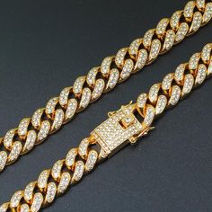 This Cuban link necklace is dripping in high sparkle and high shine. Featuring tons of zircon stones and plated in 18K white and yellow gold, this piece can be worn alone or layered with other necklaces. (Suitable for men & women) Luxury Gold Chain Necklace With Cubic Zirconia, Gold Chain Link Necklace With Cubic Zirconia, Gold Chain Cubic Zirconia Necklace, Gold Cubic Zirconia Diamond Necklace With Chain Link, Gold Link Necklace With Diamond Accents, Gold Cubic Zirconia Chain Necklace, Yellow Gold Chain Link Necklace With Cubic Zirconia, Luxury Cuban Link Cubic Zirconia Necklace, Cuban Link Yellow Gold Chain Necklace With Cubic Zirconia