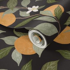 an orange and black wallpaper with green leaves on the outside, white flowers on the inside