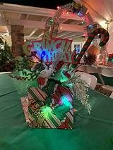 a christmas centerpiece with candy canes and lights