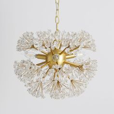 Faceted acrylic petals adorn this dazzling chandelier. The sphere shape and floral crystals reflect and distribute light to create a brilliant, beautiful glow. Designed in collaboration with renowned fashion designer Monique Lhuillier.DETAILS YOU'LL APPRECIATE Cast from iron and acrylic with clear acrylic flowers and the fixture is hand-plated in gold. Cord adjusts to your preferred height. Hardwired, professional installation is recommended. KEY PRODUCT POINTS Bulb (3) candelabra light bulbs ar Flowers Chandelier, Master Tub, Tulip Chair, Crystal Flowers, Led Shop Lights, Rug Guide, Towel Collection, Acrylic Flowers, Monique Lhuillier