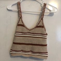 Never Worn!! Super Cute And Trendy Too For The Summer Casual Crochet V-neck Tank Top, Summer Brown Knit Crop Top, Brown Cotton Crochet Top For Spring, Brown Knit Crop Top For Spring, Brown Cotton Crochet Top For Vacation, Casual Brown Knit Crop Top, Trendy Beige Crochet Top, Brown Cotton Knit Top For Spring, Brown Sleeveless Cotton Crochet Top