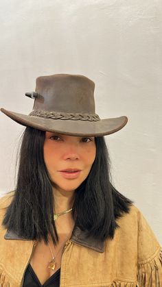 This vintage brown leather Aussie Bush hat is expertly crafted from quality leather and features a braided band with a silver plate logo depicting the iconic kangaroo and map of Australia. Unlined and measuring 52 cm, this hat strikes the perfect blend of style and function. Brown Leather Hat, Pearl Aesthetic, Map Of Australia, Plate Logo, Australia Map, Leather Hat, Leather Hats, Vintage Brown, Aesthetic Fashion