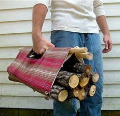 a man holding a firewood log in his hand with the caption below it