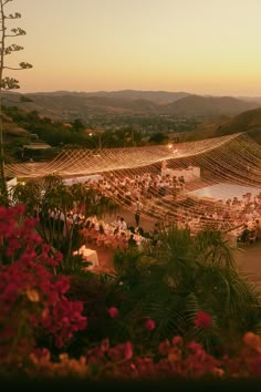 an aerial view of a wedding reception in the mountains