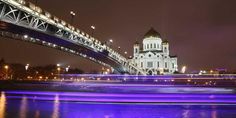 the cathedral is lit up with purple lights