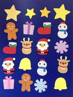 christmas cut outs are displayed on a blue background