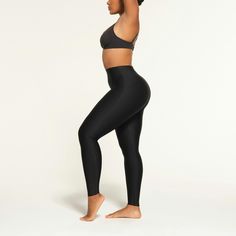 This shaping solution offers a higher rise and mid-level compression for a smooth look that’s perfect under clothing or stand-alone. Features raw edges ... Under Clothing, Shapewear, Onyx, Top Brands, Lounge Wear, Leggings, Luxury Fashion, Clothes