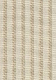 an upholstered beige and white striped fabric