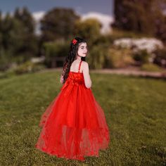 Red Flower Christmas Dresses for Toddlers and Young Girls The vibrant red color on our Fiona dress helps breathe life into any event (be it a wedding, party or pageant), and your charming little blossom is just the person to wear it. If you are searching for a red dress for a toddler girl — or a child, or pre-teen — this Fiona Dress is the one she will love to dance around in even long after the event is over. It features spaghetti straps, flower appliqués on the bodice, a multilayer tulle mulle Christmas Dresses For Toddlers, Dresses For Toddlers, Red Flower Girl, Deep Red Dress, Red Flower Girl Dresses, Sara Dress, Silver Slippers, Vermilion Red, Toddler Christmas Dress