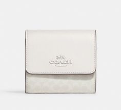 PLEASE SEE ALL PHOTOS AND READ DESCRIPTION AND DETAILS BEFORE PURCHASING * 💝NWT COACH TRIFOLD WALLET IN COLORBLOCK SIGNATURE CANVAS GLACIER WHITE/SILVER. * BRAND NEW WITH TAGS * - SEALED IN ORIGINAL PACKAGING - LEATHER/COATED SIGNATURE CANVAS - SNAP CLOSURE - OUTSIDE POCKET - CREDIT CARD SLOTS - SEE LAST PIC FOR MORE DETAILS AND MEASUREMENTS - STORED IN SMOKE/ PET FREE ENVIRONMENT - NO ADDITIONAL DISCOUNTS/ RETURNS - NO INTERNATIONAL, ALASKA OR HAWAII SHIPPING * ALL ITEMS SOLD ARE 100% AUTHENTI Coach White Wallet, White Coach Wallet, Coach Wallets, White Wallet, Style Lookbook, Cute Wallets, Coach Wallet, Designer Wallets, Signature Canvas