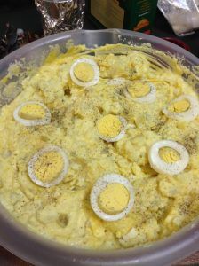 an egg and cheese dish in a plastic container