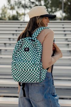 A classic backpack, the Old Skool Grom Check Backpack has a two-pocket design featuring a slip-in organizer to keep your important items neatly arranged and a side water bottle pocket for easy hydration. To add more style, the backpack has an iconic checkerboard print and the Vans logo. shell: 100% recycled polyester fabric lining: 100% recycled polyester fabric water bottle pocket slip-in interior pocket capacity: 18 liters dimensions: 15.5'' X 11.5'' X 4.5'' Athleisure Mom, Mom Accessories, Vans Logo, Recycled Polyester Fabric, Capri Blue, Classic Backpack, Plus Size Shopping, Sneaker Heels