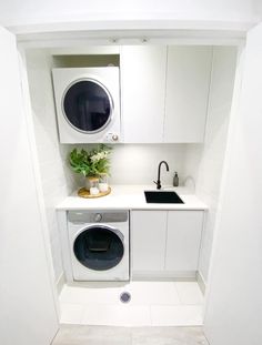 a washer and dryer in a small room