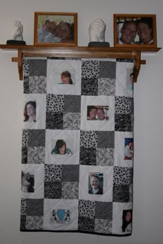 a quilt hanging on a wall next to two pictures