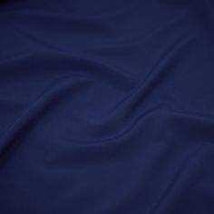 a close up view of a blue fabric