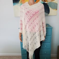 One Size. Knit Ivory Poncho From World Market White Fall Sweater For Vacation, White Sweater For Winter Vacation, White Winter Sweater For Vacation, White Winter Vacation Sweater, White Knit Poncho For Fall, Beige Knit Poncho For Spring, Spring Beige Knit Poncho, White Long Sleeve Poncho For Fall, White Fall Poncho