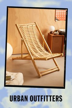 a wooden chair sitting on top of a carpeted floor