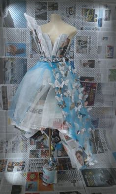 a dress made out of newspapers and magazines