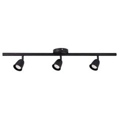 three spotlights are mounted on the ceiling in an industrial style lighting fixture with black finish