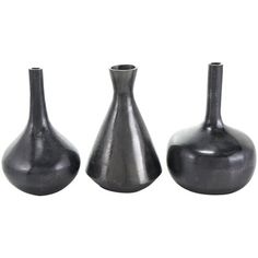 three black vases sitting next to each other on a white background, one is empty