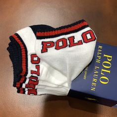 Polo Ralph Lauren 3 Pack Classic Sport Socks Nwt Cushion Comfort Sole Fits Shoe Size 6-12.5 Colors : White/ Red/ Navy Sporty Anti-odor Cotton Socks, Sporty Cotton Socks With Letter Print, Casual White Anti-odor Socks, White Sporty Socks For Winter, White Sporty Winter Socks, Sports Cotton Socks With Letter Print, White Sports Socks With Letter Print, Sporty Red Cotton Socks, Casual Cotton Sports Socks