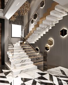 an elegant staircase with marble steps leading up to the second floor