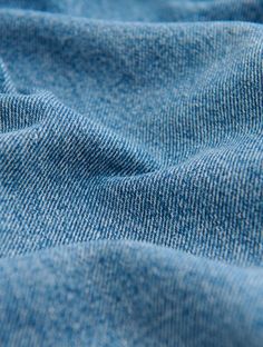 closeup view of blue denim fabric texture