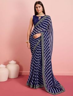 𝐍𝐚𝐯𝐲 𝐃𝐫𝐞𝐚𝐦: 𝟕𝟎% 𝐎𝐟𝐟 𝐒𝐚𝐫𝐞𝐞! Leheriya & lace meet Georgette! Get 70% off this exclusive navy party saree at Fabanza. Shop now: https://fabanza.co.uk/navy-blue-georgette-party-wear-saree-with-leheriya-print-fabsa22277 #FabanzaFashion #WeekendSale #sareestyle #indiansaree #sareefashion #ethnicwear #FabanzaFashionUK Pakistani Fashion Casual, Party Wear Saree, Dress Attire, Casual Saree