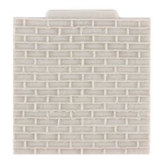 a piece of white tile on a white background