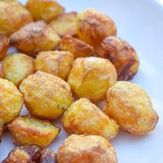 some fried food is on a white plate