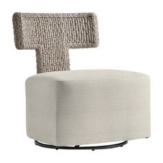 an upholstered chair with the letter t on it