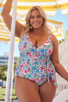 Blonde curve model next to the pool wearing a bright floral coloured wrap one piece with faux crossover tie Jantzen Swimwear, Summer Fields, Mastectomy Swimwear, Black Tankini Top, Animal Print Swimwear, Swimwear Australia, Retro Swimwear, Black Tankini, Curvy Swimwear