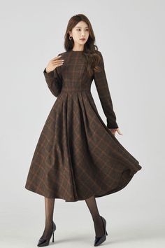 Rock the chic look with this Long Sleeve Plaid Midi Wool Dress. Stay cozy and stylish all day. 

SKU 4523 
Link in bio 

#Fashion #WinterStyle #PlaidDress #MidiDress #WoolDress #Xiaolizihandmade Fitted A-line Plaid Dress For Fall, Formal Wool Tweed Dress For Fall, Wool Tweed Dress For Formal Fall Occasions, Fall Formal Wool Tweed Dress, Winter Midi-length Tweed Dress, Winter Midi Length Tweed Dress, Long Sleeve Brown Plaid Dress For Fall, Fall Tweed Midi Length Dress, Classic Fitted Tweed Dress For Fall