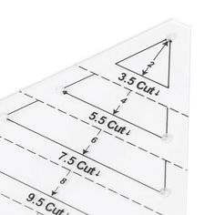 a triangle shaped ruler with measurements on it