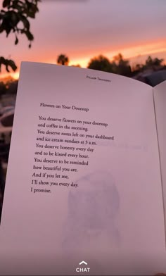 an open book with a poem written on it