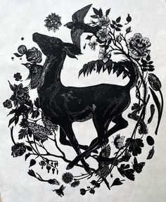 a black and white drawing of a deer surrounded by flowers