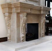 a large fireplace in the middle of a living room with white walls and flooring