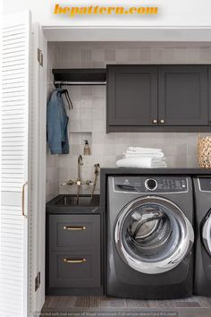 a washer and dryer in a small laundry room with dark wood cabinets, white tile flooring and gray countertops