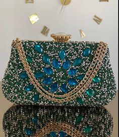 Who doesn't want to go out at night with a stylish bag in hand? This beautiful bag, designed with stone and representing your heart, will leave you in awe.❤️ You can get a stylish look by using it as a handbag. The whole bag is embroidered with stones. Handmade is special Women's Green Beads And Stones Evening Dress Bag You can buy it as a gift for yourself or your loved ones. An elegant bag that you will love to use in weddings, elegant invitations and special meals awaits you. Come on, what ar Embellished Party Clutch Bag, Party Handheld Embellished Bags, Elegant Pouch Bags With Rhinestones, Elegant Rhinestone Pouch Bag, Glamorous Handheld Bag For Events, Glamorous Green Evening Bag, Glamorous Wedding Evening Bag With Detachable Handle, Green Clutch Shoulder Bag For Party, Green Top Handle Evening Bag For Party