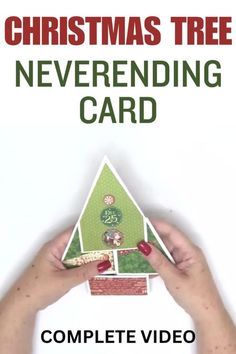 someone holding up a christmas tree card with the words,'christmas tree neverending card complete video '