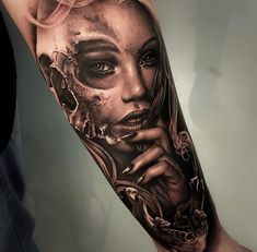 a woman's arm with a tattoo on it and an image of her face