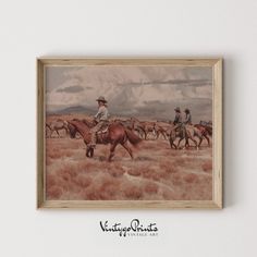 a painting of cowboys riding horses in the desert