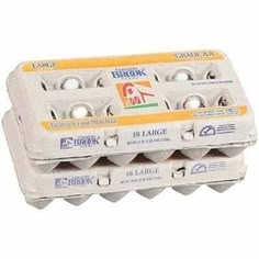 an egg carton with four eggs in it